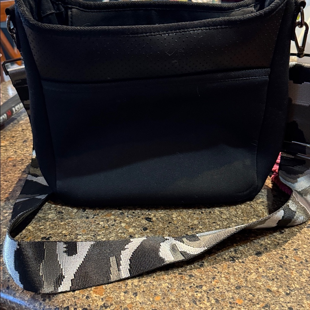 Haute Shore Neoprene bucket purse